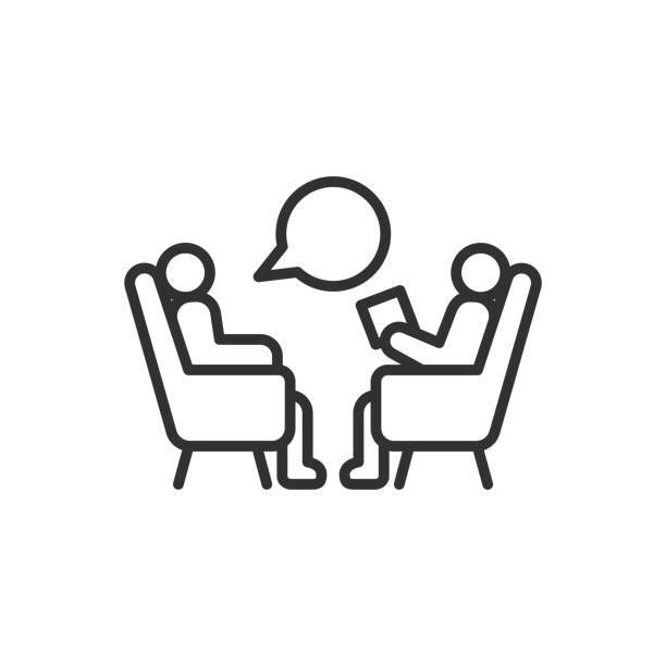 two people sitting in chairs who are conversing